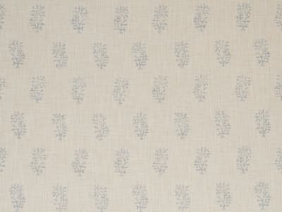 Blue botanical sprigs on ivory