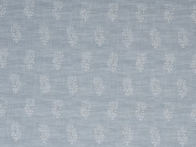 White botanical motif on soft blue
