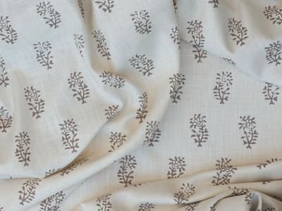 Brown botanical motif on beige