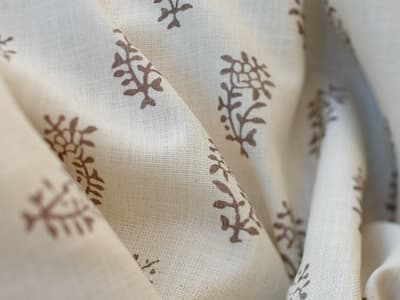 Brown botanical motif on beige
