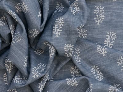 White botanical motif on soft blue