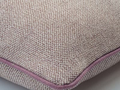 Cushion with a two-tone weave
