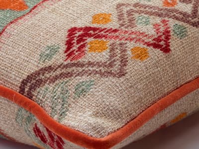 Cushion with intricate print in sunset