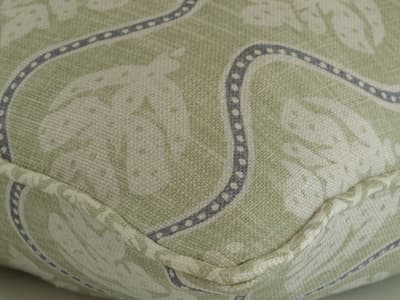 Leaf motif cushion in green