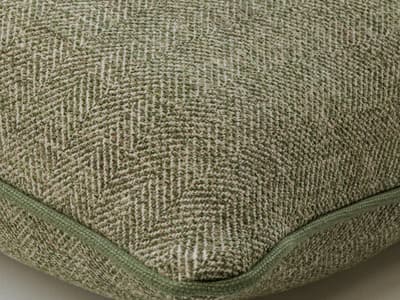 Cushion with herringbone weave in zucchini