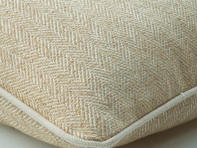 Cushion in a textured herringbone weave
