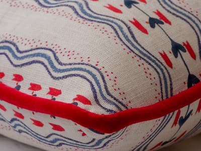 Cushion in vivid blue and red
