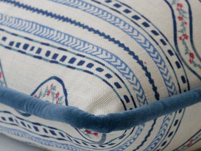A cushion of classic stripes with folkloric flair