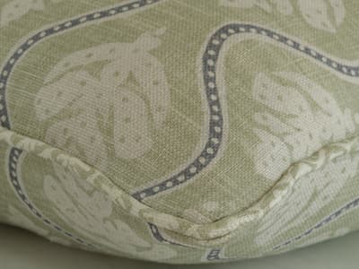 Leaf motif cushion in green