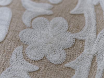 Calming floral embroidery cushion