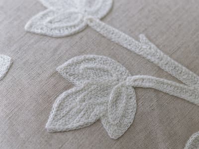 Calm tropical embroidery cushion