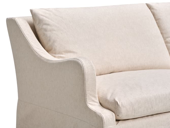 Relaxed slipcover sofa in cream basket weave
