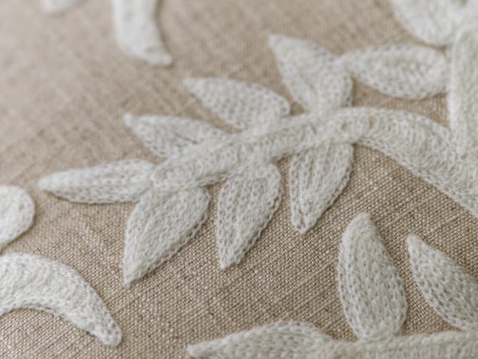 Calm stylised embroidery cushion