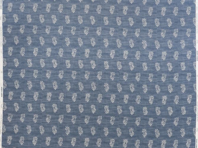 White botanical motif on soft blue