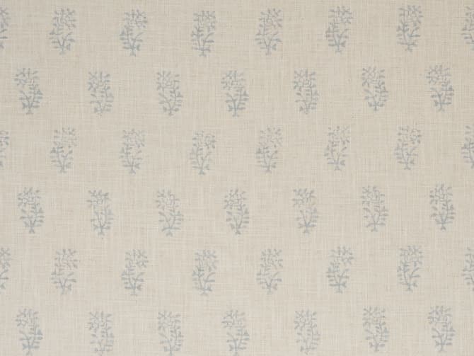 Blue botanical sprigs on ivory