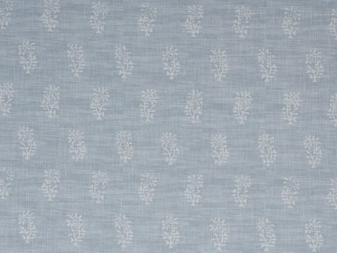 White botanical motif on soft blue