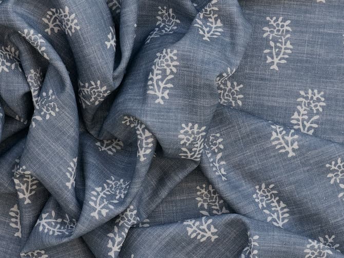 White botanical motif on soft blue