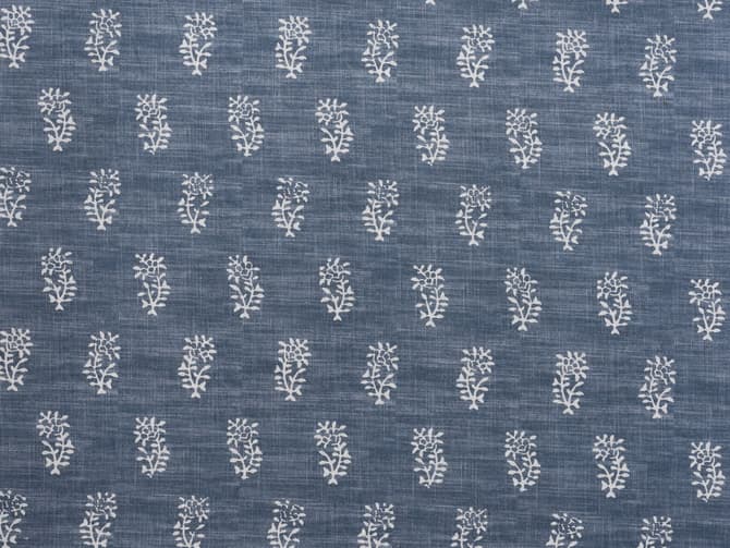 White botanical motif on soft blue
