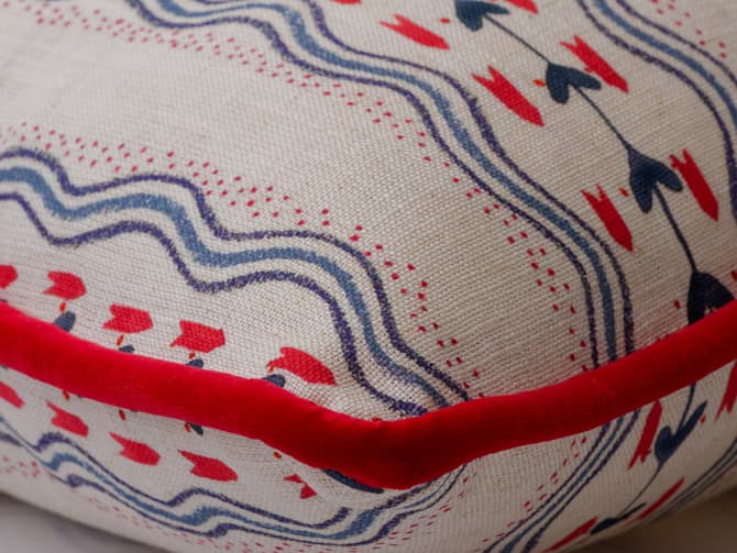 Cushion in vivid blue and red