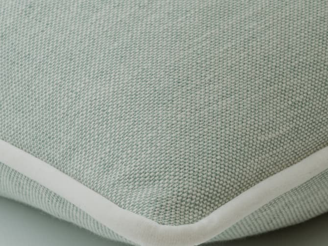 Cushion in soft washed blue