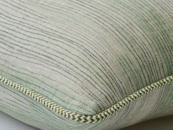 Cushion in gentle green brush marks