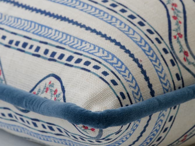 A cushion of classic stripes with folkloric flair