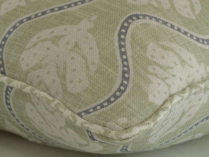 Leaf motif cushion in green