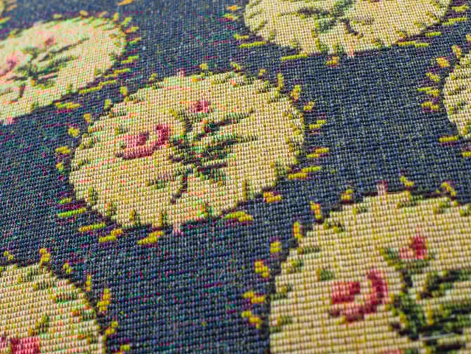 Floral cushion in deep blue