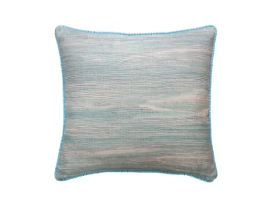 Cushion in soft blue brush marks