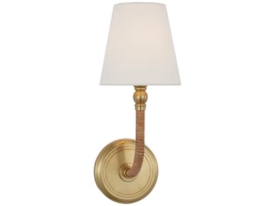 wall light in brass and natural rattan