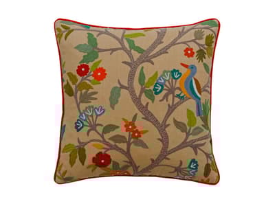 Vibrant woodland embroidery cushion