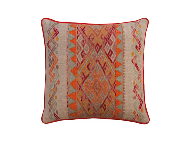 Cushion with intricate print in sunset